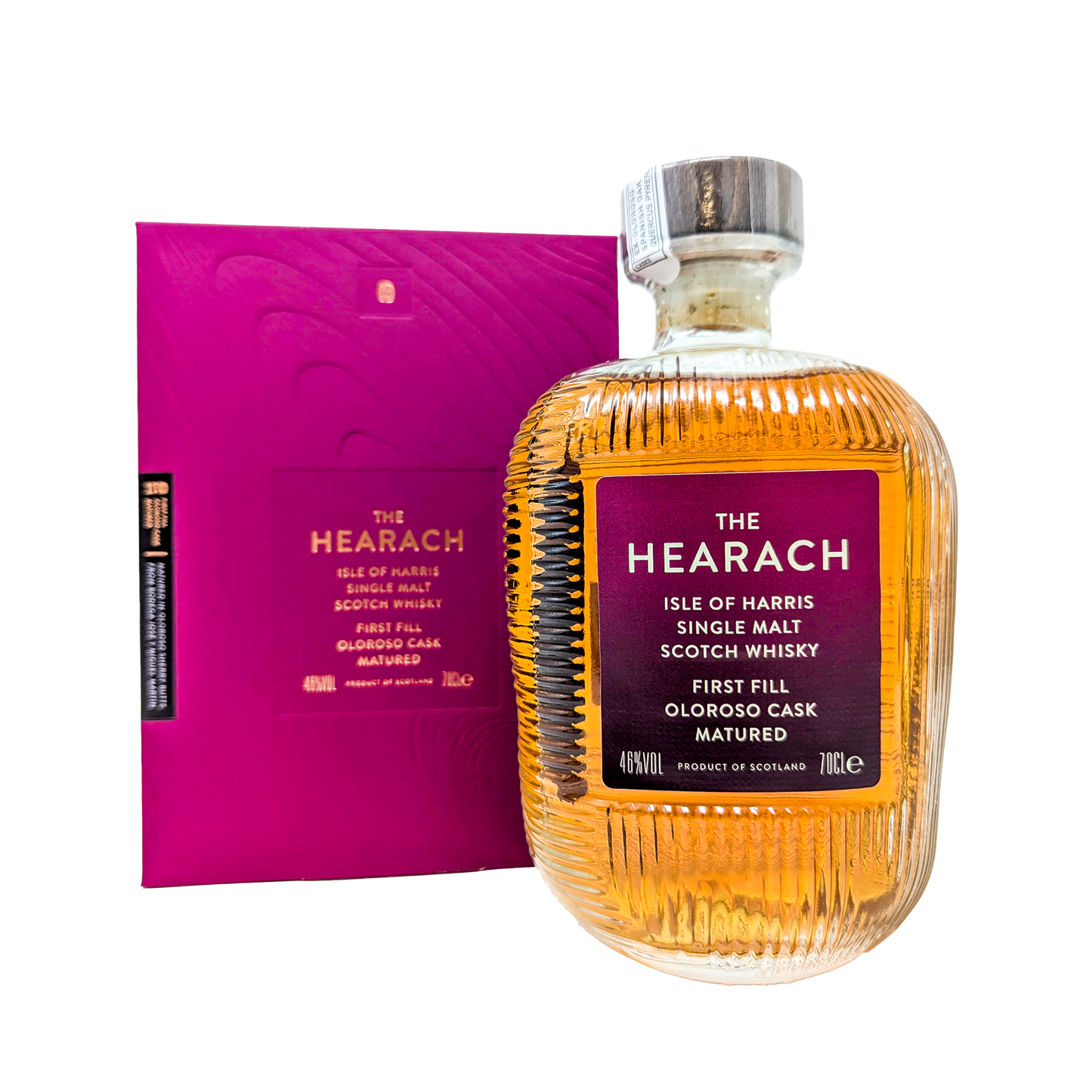 A bottle of Oloroso Cask hearach single malt whisky sitting in front of the oloroso Hearch magenta box