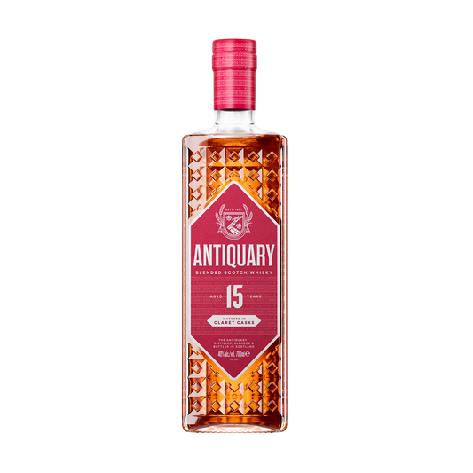 a bottle of the antiquary 15 claret cask blended whisky with its red label and its diamond shape indented bottle with dark red whisky 
