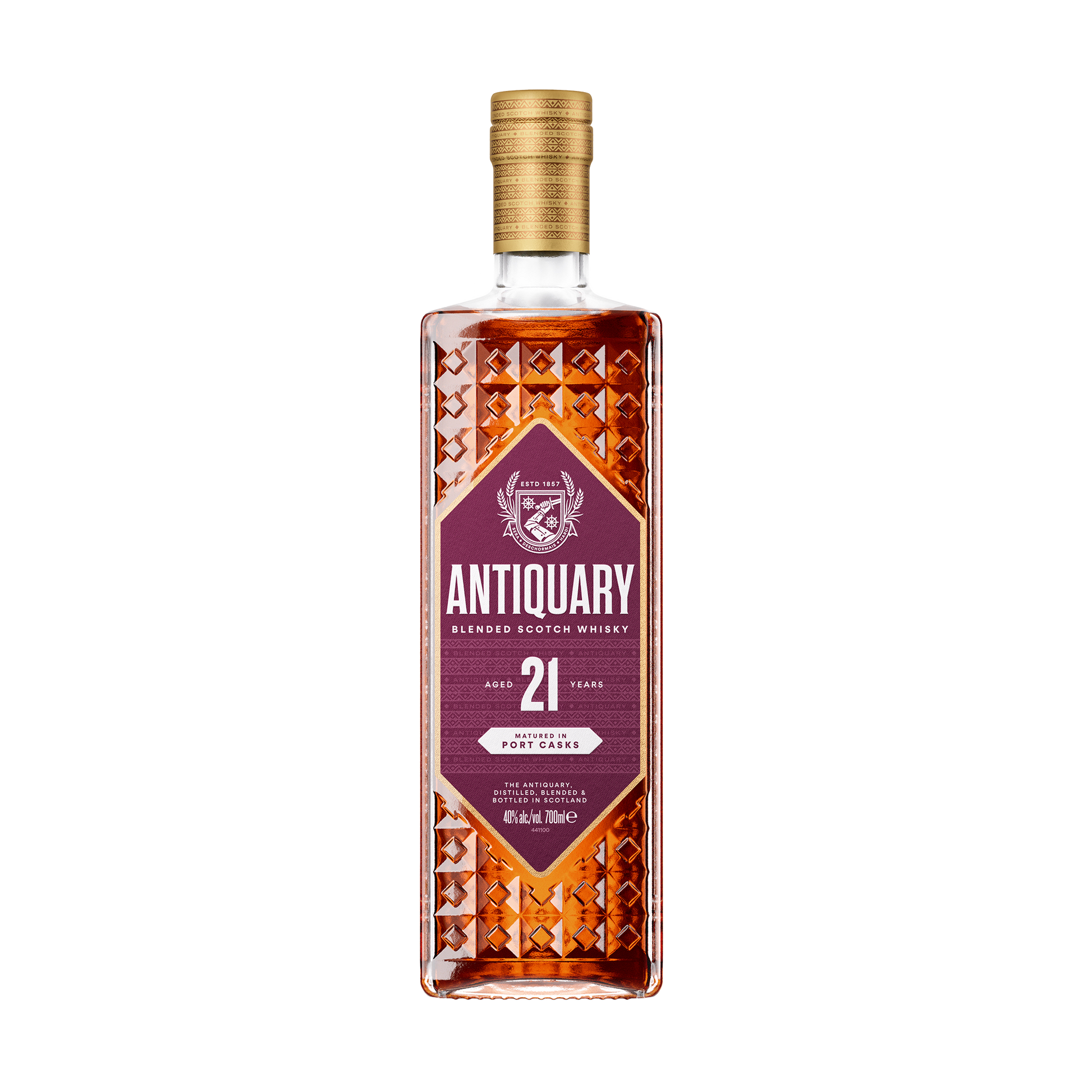 A bottle of the Antiquary 21 year old port cask blended whisky with its purple label and diamond indents on the bottle dark red whisky 