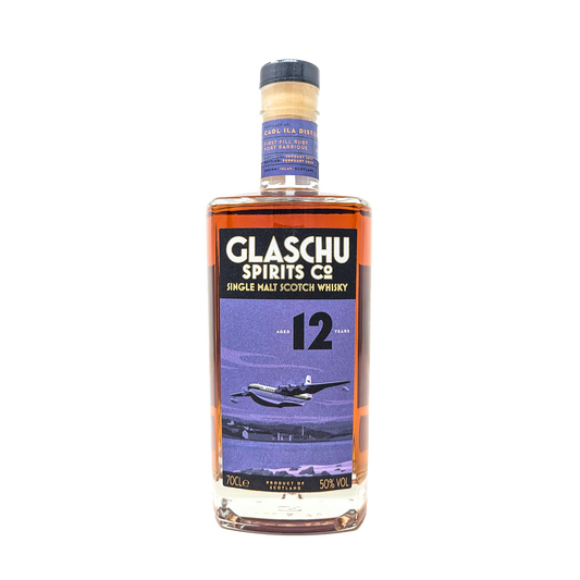 a bottle of caol ila  single malt whisky independantly bottled by Glaschu spirits Co with a purple label depicting the Sanders-Roe Princess, the biggest flying boat in the world, doing a low pass over the Caol Ila distillery