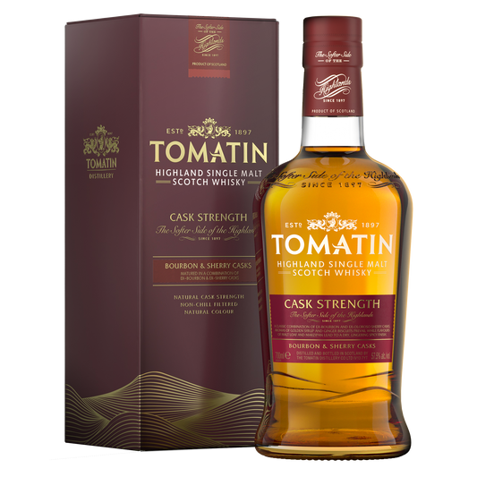 A bottle of tomatin cask strength single malt whisky with its red label filled with golden amber whisky and gold writing beside its dark red carton with gold writing 