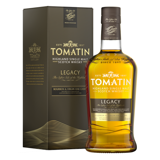 A bottle of Tomatin legacy single malt whisky with gold whisky inside the bottle and beside the khaki and gold coloured carton 