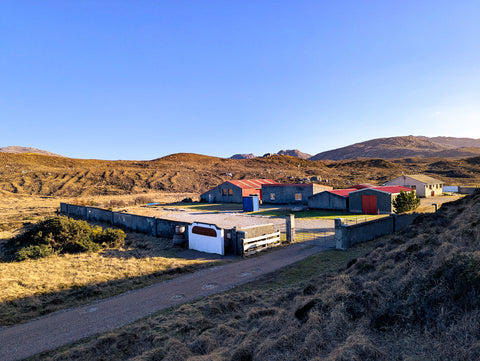Overview Abhainn Dearg distillery on a bright sunny day 