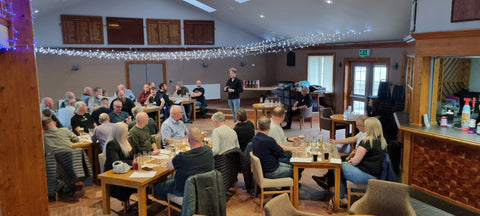 The crowd sitting at the Tomatin whisky tasting listening to Scott Adamson 